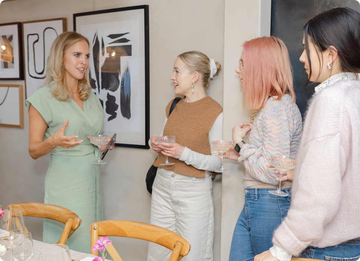 Kirsten talking to three women