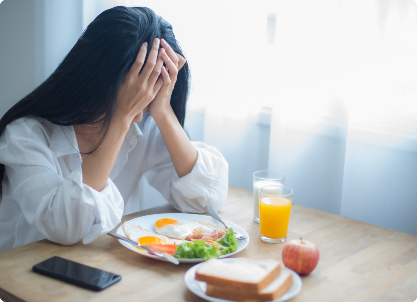 Woman at a dinner table