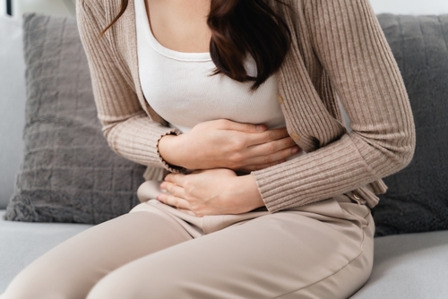 The,Woman,With,A,Stomachache,Is,Holding,Her,Stomach,In